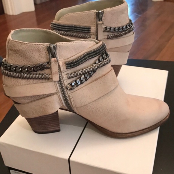 Edgy, multi-chain Dolce Vita booties - Picture 2 of 4
